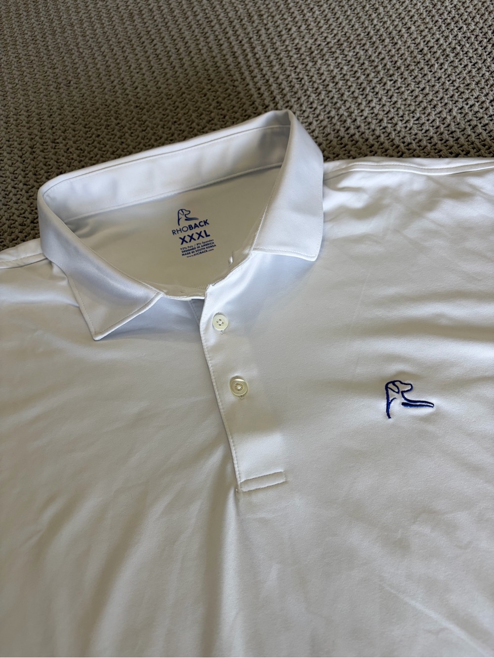 Rhoback White Polo with Navy Embroidered Logo